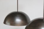 Set of Three Modernist Blackened Steel Three Fixture Dome Pendant Lights - Image 11