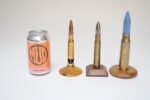 Set of Three Vintage Trench Art Bullet Casing Paperweights and Flint Lighter - Image 8