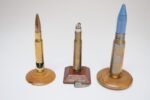 Set of Three Vintage Trench Art Bullet Casing Paperweights and Flint Lighter - Image 6
