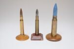 Set of Three Vintage Trench Art Bullet Casing Paperweights and Flint Lighter - Image 5
