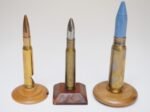Set of Three Vintage Trench Art Bullet Casing Paperweights and Flint Lighter - Image 4