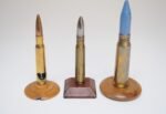 Set of Three Vintage Trench Art Bullet Casing Paperweights and Flint Lighter - Image 3