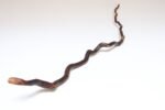 American Folk Art Hand-Carved Wooden Spindly Snake Sculpture - Image 2