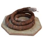 Vintage Folk Art Hand-Carved Wood and Bottlecap Snake on Octagonal Base
