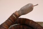 Vintage Folk Art Hand-Carved Wood and Bottlecap Snake on Octagonal Base - Image 14