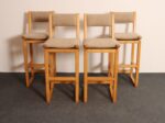 Set of Four Vintage Postmodern Swiveling Bar Stools in Oak and Tawny Bouclé - Image 2