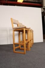 Set of Four Vintage Postmodern Swiveling Bar Stools in Oak and Tawny Bouclé - Image 4