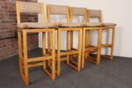 Set of Four Vintage Postmodern Swiveling Bar Stools in Oak and Tawny Bouclé - Image 3