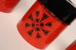 Set of Three Japanese Modern Nesting Canisters With Red and Black Floral Decoration - Image 10
