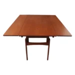 Danish Modern "Elevator" Metamorphic Coffee Table / Dining Table with Two Leaves