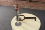 Pair of Art Deco Chrome and Copper Column Form Andirons - Image 2