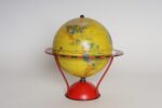Vintage Replogle Yellow and Red Tin Litho "Globe Grams' Spinning World Globe - Image 2