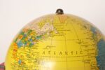Vintage Replogle Yellow and Red Tin Litho "Globe Grams' Spinning World Globe - Image 5