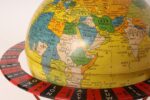 Vintage Replogle Yellow and Red Tin Litho "Globe Grams' Spinning World Globe - Image 8
