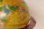 Vintage Replogle Yellow and Red Tin Litho "Globe Grams' Spinning World Globe - Image 10